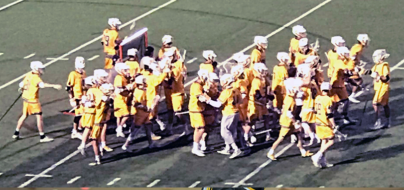 Yellow Jackets celebrate after 8-6 OAC Tournament semifinal victory.