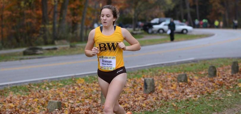 Kelly Brennan earns First All-OAC honor with fourth place finish.