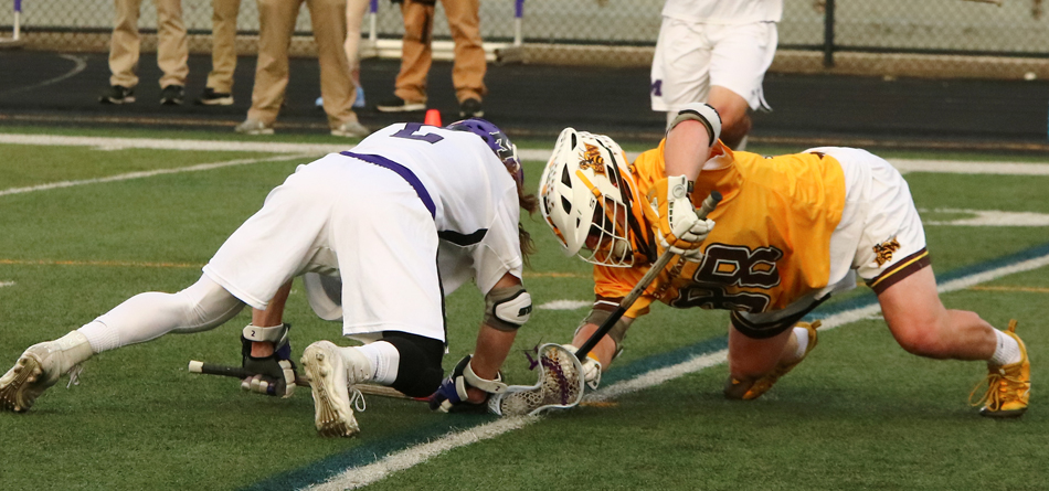 Alexander Bishop won a career-high 16 faceoffs, including two late in the game to seal a 17-15 victory over Otterbein (Photo courtesy of Mike Bower)
