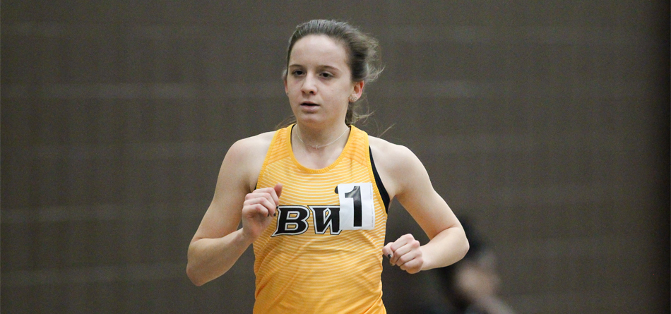 Junior All-American distance runner Kelly Brennan broke the school's 5,000-meter run record in the first meet of the season