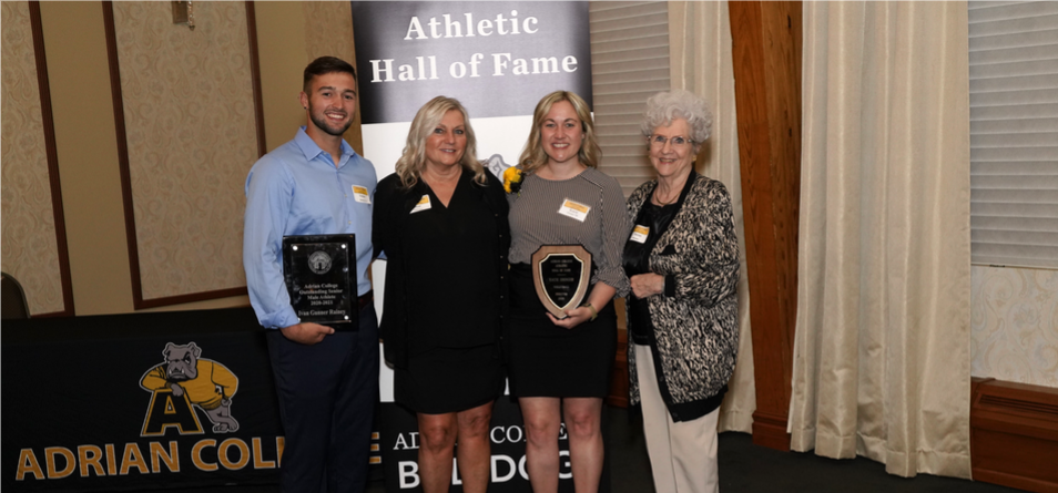 BW Women's Volleyball Head Coach and Adrian (Mich.) College Athletics Hall of Fame Inductee Kacie Ehinger pictured alongside family at induction ceremony (photo courtesy of Mike Dickie).